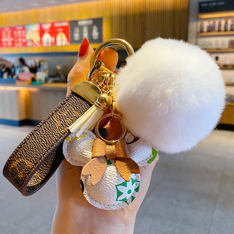 Llavero de lujo de Mickey – Cuero sintético & Colgante con pompón de piel para bolso o automóvil