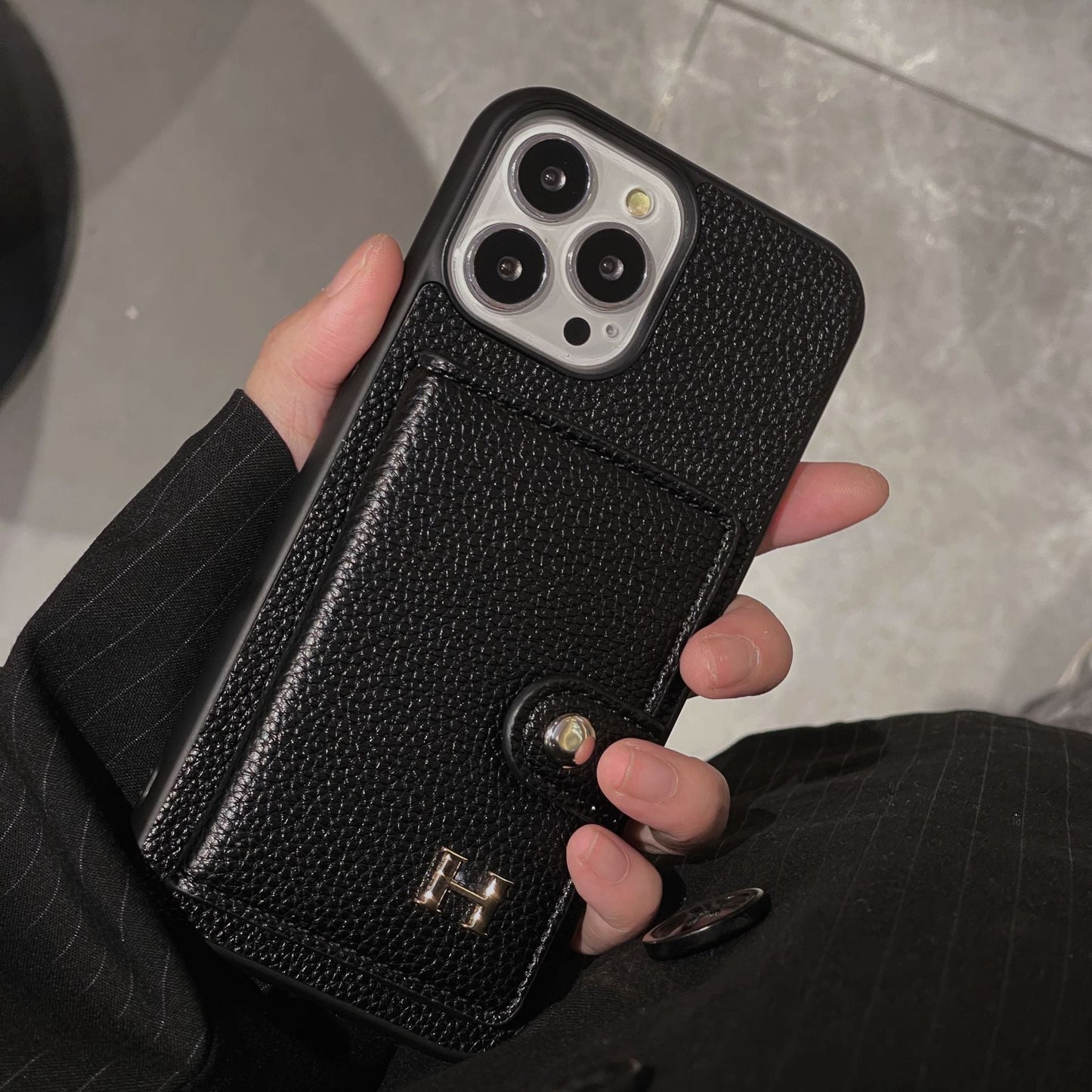 H Skórzane etui na karty do iPhone'a
