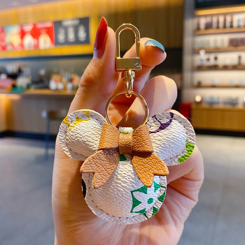 Llavero de lujo de Mickey – Cuero sintético & Colgante con pompón de piel para bolso o automóvil