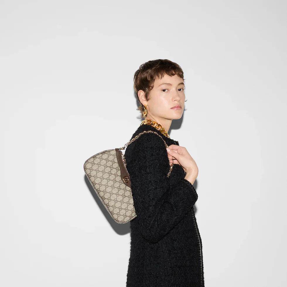 Kangaskuvioinen olkalaukku