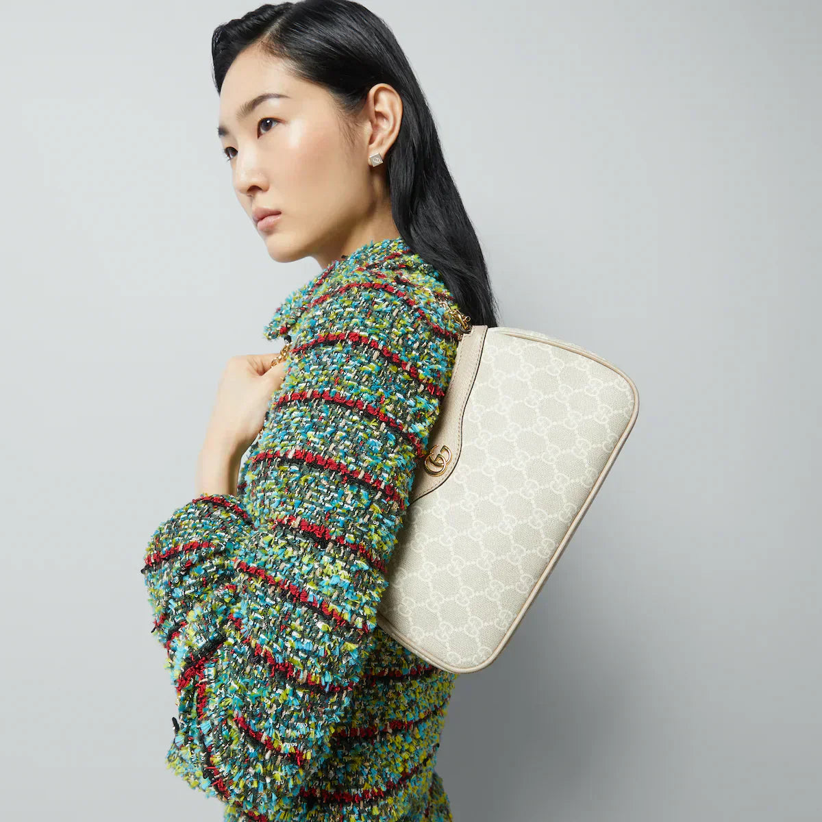 Kangaskuvioinen olkalaukku