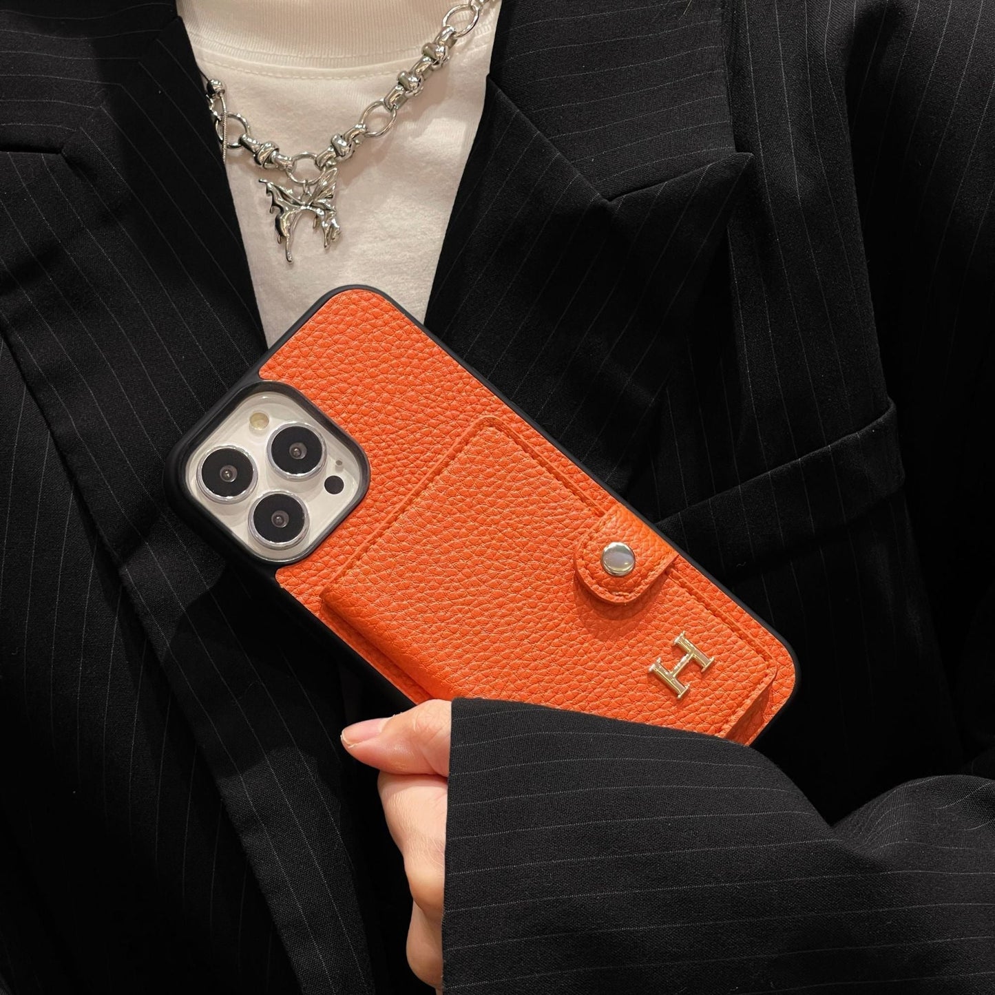 H Skórzane etui na karty do iPhone'a