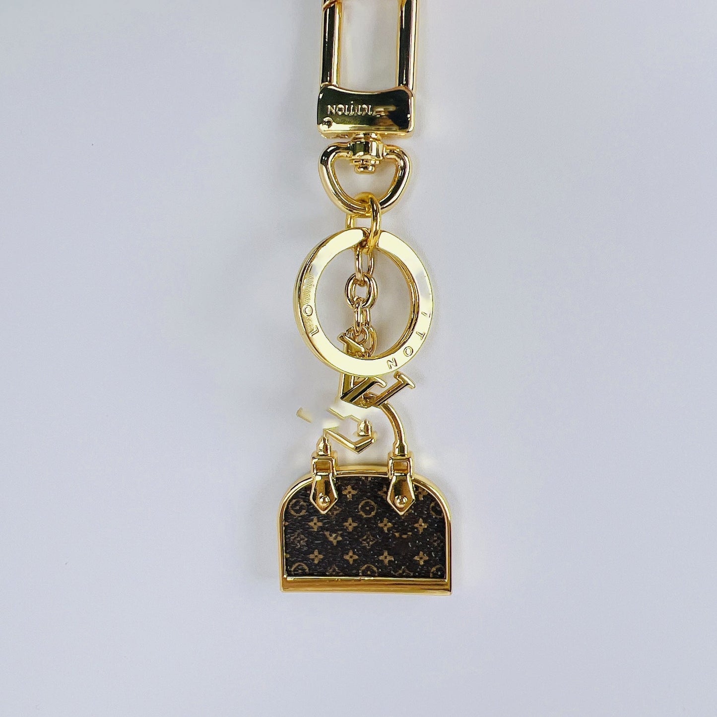 Designer-Minitasche mit Schlüsselanhänger