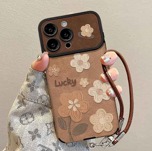 Floral skinntelefonveske med avtakbar håndleddsstropp